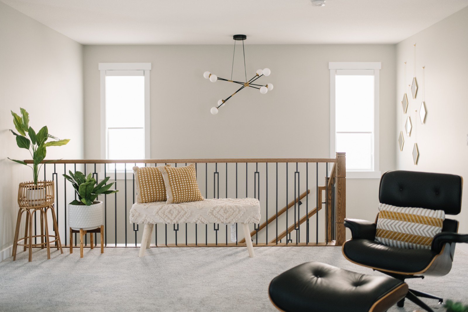 A convenient bench placed at the top of the stairs in the bonus room of the Bianca showhome