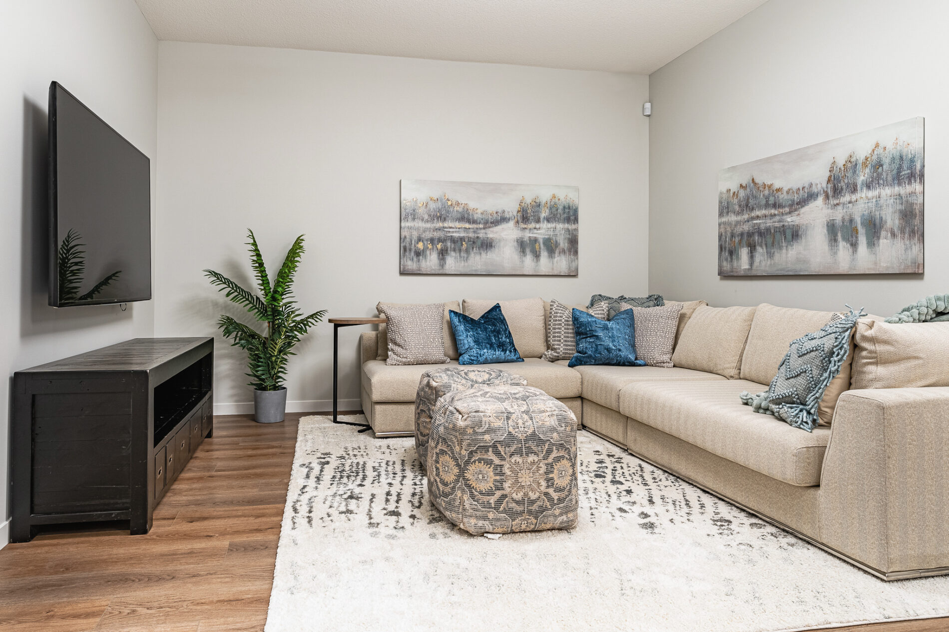 Cozy living room of the basement Revenue suite in the Cassius showhome
