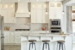 The Executive Chef Built-In kitchen lifestyle package shown in the Sculptor showhome in Griesbach